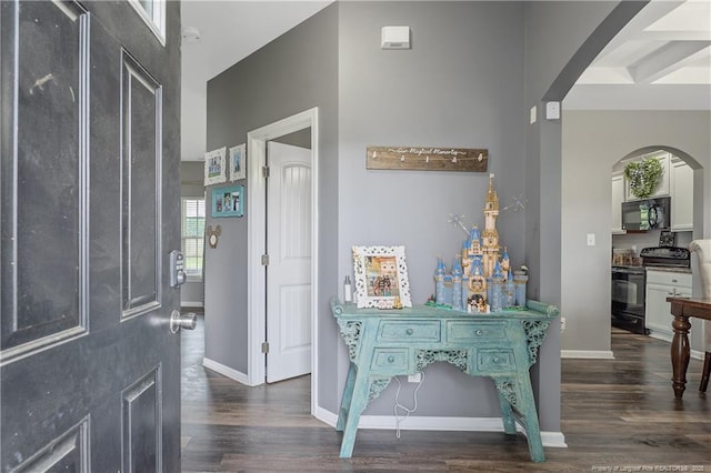 4943 Lion Heart Ln, Parkton, NC 28371 - foyer with arched walkways, dark wood-style floors, and baseboards