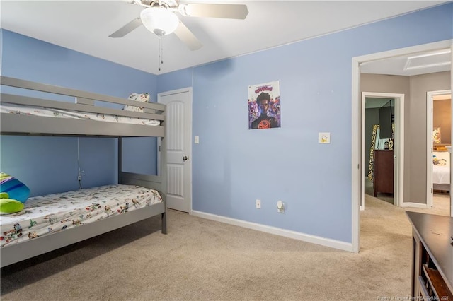 4943 Lion Heart Ln, Parkton, NC 28371 - carpeted bedroom featuring baseboards and a ceiling fan