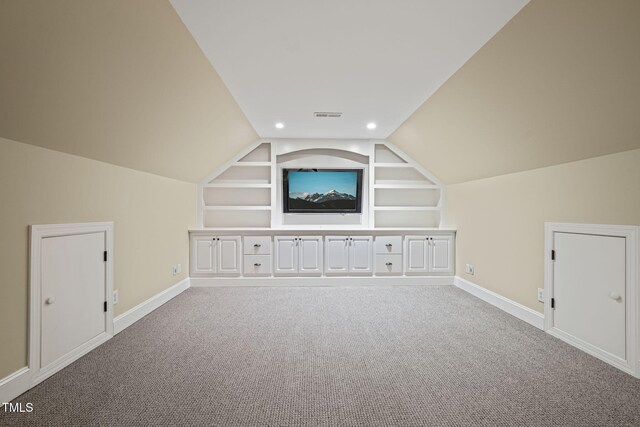 3324 Thomas Rd, Raleigh, NC 27607 - additional living space featuring built in shelves, vaulted ceiling, carpet floors, and recessed lighting