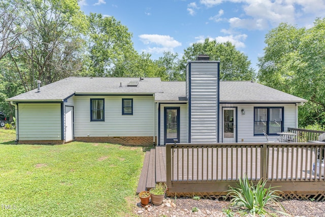 5617 Groomsbridge Ct, Raleigh, NC 27612 - rear view of house with a deck, a yard, a chimney, and a shingled roof