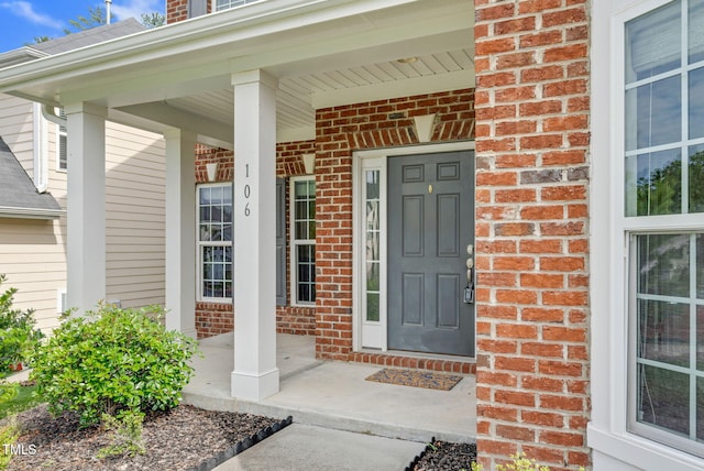 106 Elmsford St, Durham, NC 27703 - entrance to property featuring a porch and brick siding