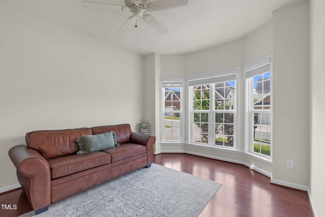 106 Elmsford St, Durham, NC 27703 - living room featuring healthy amount of natural light, baseboards, and dark wood-style flooring