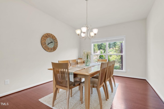 106 Elmsford St, Durham, NC 27703 - dining area with hardwood / wood-style floors, a chandelier, and baseboards