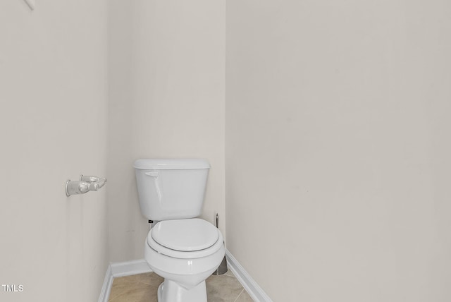 106 Elmsford St, Durham, NC 27703 - bathroom featuring tile patterned flooring, toilet, and baseboards