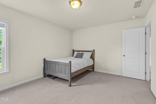 106 Elmsford St, Durham, NC 27703 - bedroom with carpet and baseboards