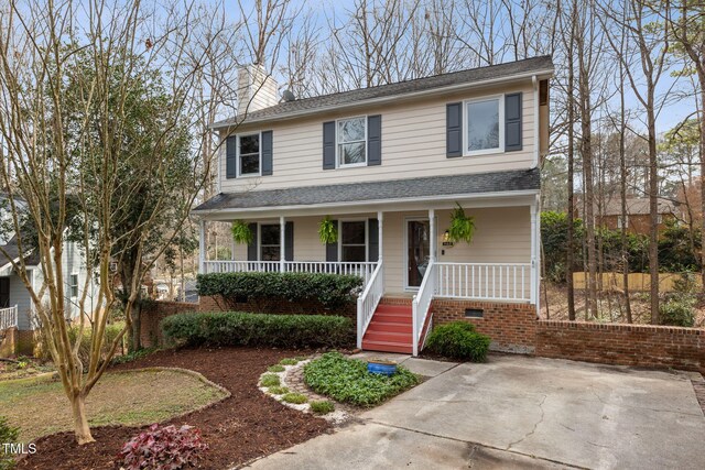 905 Balmoral Dr, Cary, NC 27511 - view of front of home featuring a porch, a chimney, roof with shingles, and stairway