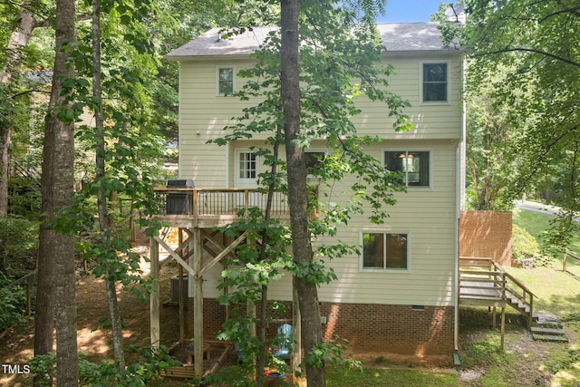 905 Balmoral Dr, Cary, NC 27511 - rear view of property with stairs, a deck, and a shingled roof
