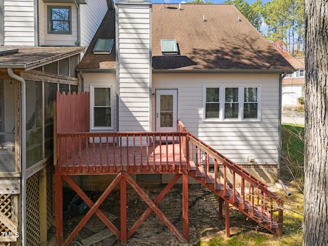 12 Citation Dr, Durham, NC 27713 - back of house with roof with shingles, a chimney, a wooden deck, and stairs