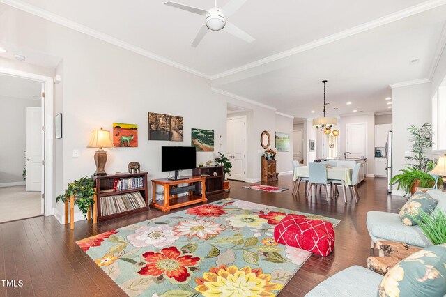47 Coventry Ln, Chapel Hill, NC 27516 - living room with dark wood finished floors, baseboards, a ceiling fan, crown molding, and recessed lighting