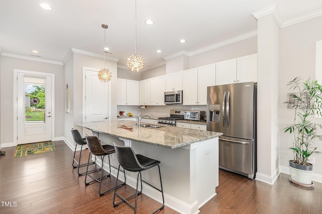 47 Coventry Ln, Chapel Hill, NC 27516 - kitchen with stainless steel appliances, a sink, baseboards, recessed lighting, and dark wood-style flooring