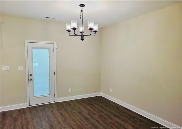 2312 Smith Rd, Hope Mills, NC 28348 - unfurnished room featuring a chandelier, dark wood finished floors, and baseboards