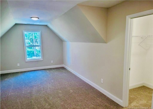 2312 Smith Rd, Hope Mills, NC 28348 - bonus room with carpet flooring, vaulted ceiling, and baseboards