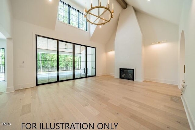 3422 Redbud Ln, Raleigh, NC 27607 - unfurnished living room with high vaulted ceiling, wood finished floors, a chandelier, a fireplace, and baseboards