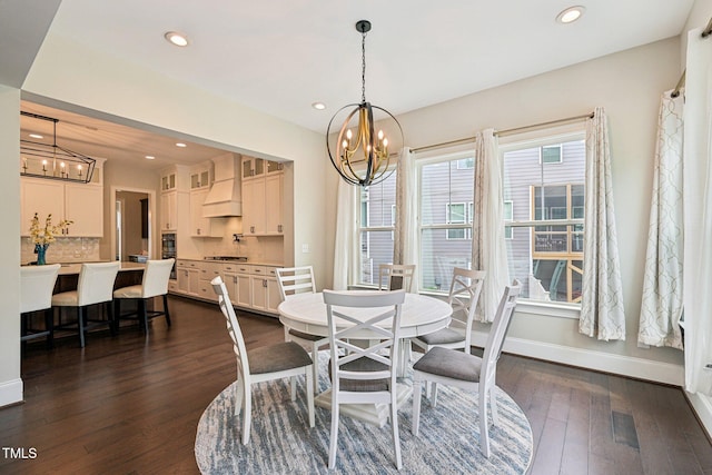 421 Gilpin Way, Cary, NC 27519 - dining space with a chandelier, dark wood-type flooring, baseboards, and recessed lighting
