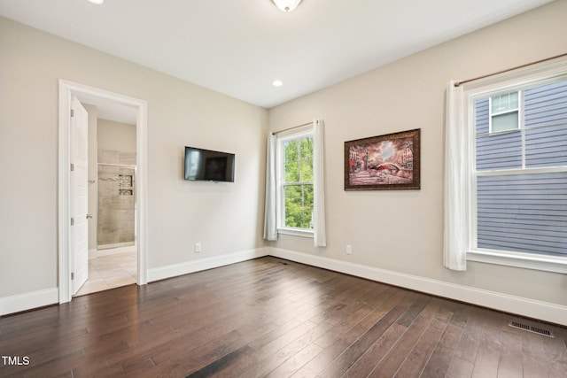 421 Gilpin Way, Cary, NC 27519 - unfurnished room with dark wood-type flooring, baseboards, and recessed lighting