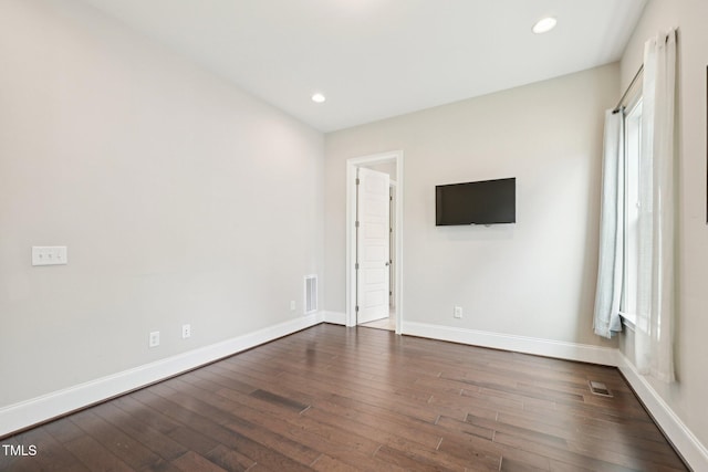 421 Gilpin Way, Cary, NC 27519 - unfurnished room with dark wood-type flooring, baseboards, recessed lighting, and healthy amount of natural light