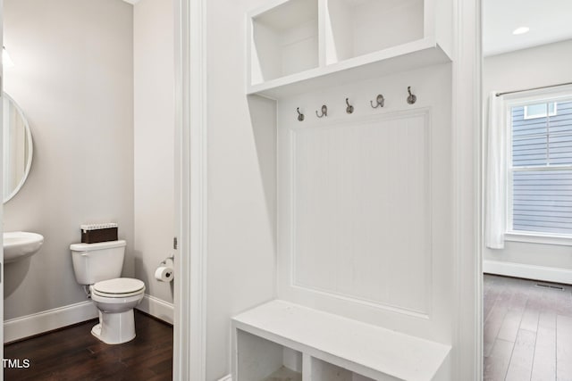 421 Gilpin Way, Cary, NC 27519 - mudroom with dark wood-style floors and baseboards