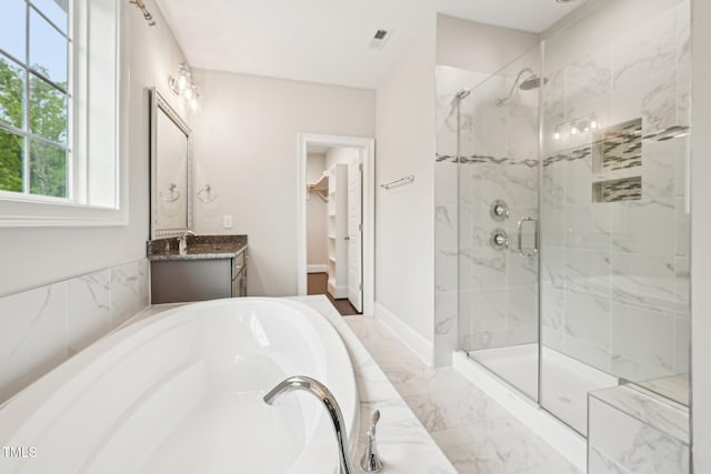 421 Gilpin Way, Cary, NC 27519 - bathroom with a stall shower, a bath, vanity, baseboards, and marble finish floors