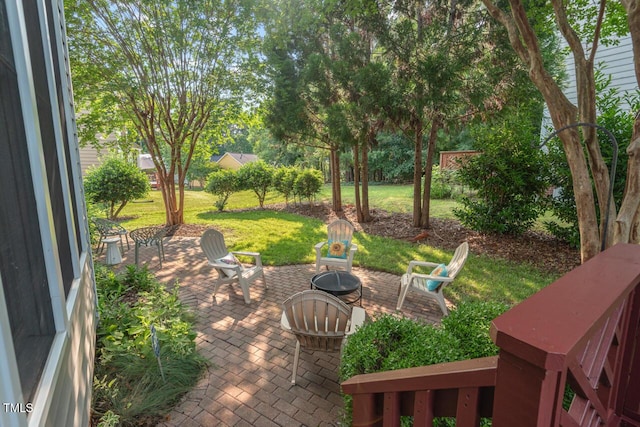 1504 Haventree Rd, Durham, NC 27713 - view of grassy yard featuring a patio