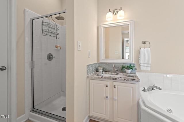 1504 Haventree Rd, Durham, NC 27713 - bathroom featuring a stall shower, a whirlpool tub, and vanity