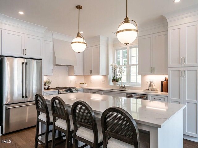 2641 Sidford Aly, Raleigh, NC 27608 - kitchen featuring appliances with stainless steel finishes, custom range hood, a sink, a center island, and white cabinetry