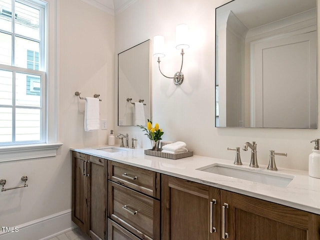 2641 Sidford Aly, Raleigh, NC 27608 - full bathroom featuring double vanity, ornamental molding, and healthy amount of natural light
