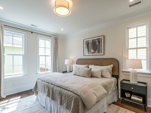 2641 Sidford Aly, Raleigh, NC 27608 - bedroom with crown molding, baseboards, wood finished floors, and recessed lighting
