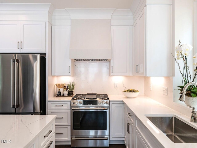 2641 Sidford Aly, Raleigh, NC 27608 - kitchen with appliances with stainless steel finishes, a sink, custom exhaust hood, and white cabinets