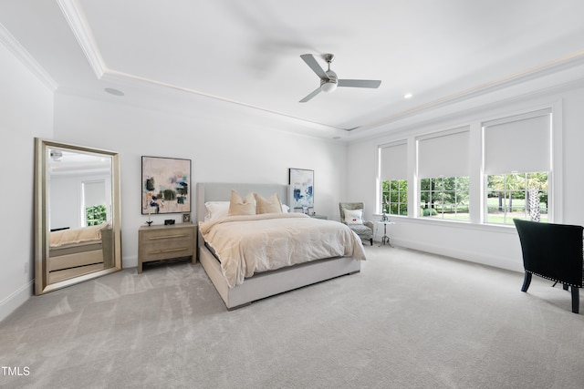 7545 Hasentree Club Dr, Wake Forest, NC 27587 - bedroom featuring carpet flooring, a raised ceiling, crown molding, baseboards, and a ceiling fan