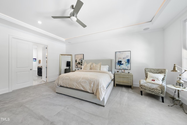 7545 Hasentree Club Dr, Wake Forest, NC 27587 - carpeted bedroom featuring crown molding, a tray ceiling, baseboards, ceiling fan, and ensuite bath