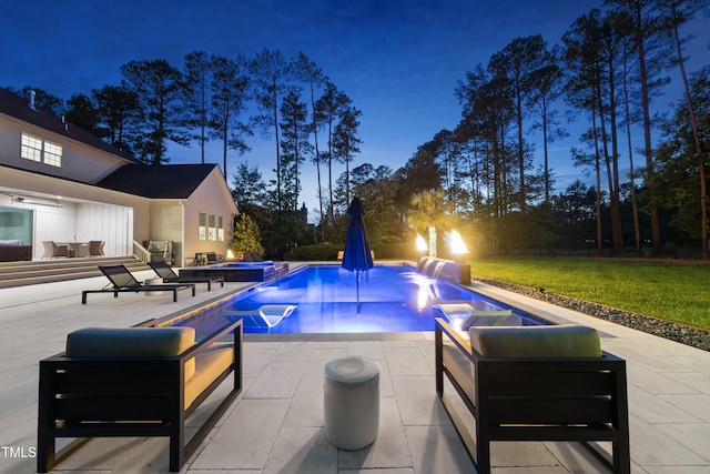 7545 Hasentree Club Dr, Wake Forest, NC 27587 - view of swimming pool featuring a patio area, a lawn, and a pool with connected hot tub