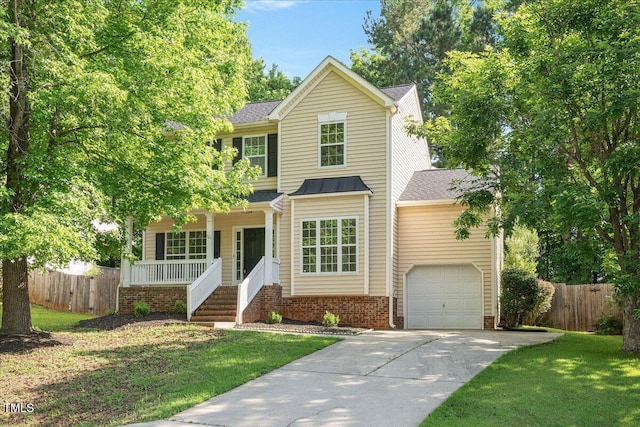 121 River Hills Dr, Clayton, NC 27527 - traditional home with a porch and concrete driveway