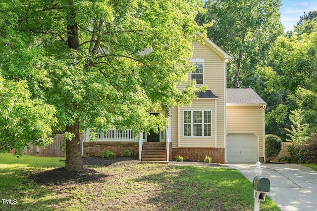 121 River Hills Dr, Clayton, NC 27527 - obstructed view of property with concrete driveway, a porch, a garage, and brick siding
