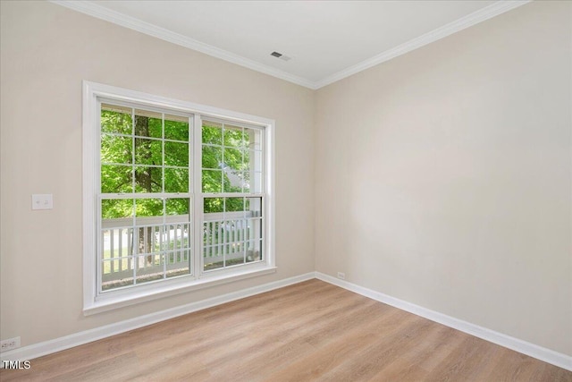 121 River Hills Dr, Clayton, NC 27527 - unfurnished room featuring baseboards, light wood finished floors, and ornamental molding