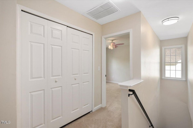 121 River Hills Dr, Clayton, NC 27527 - corridor featuring light colored carpet and baseboards