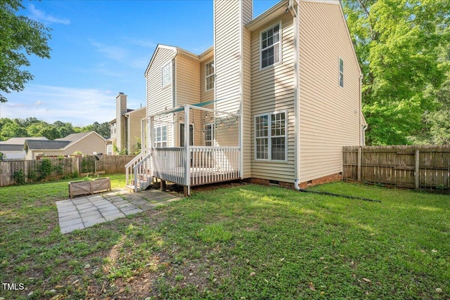 121 River Hills Dr, Clayton, NC 27527 - rear view of property with crawl space, a wooden deck, a patio area, and a chimney