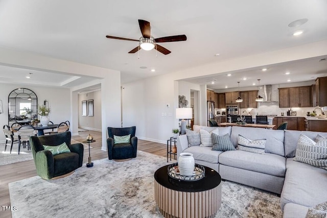 1021 Dillon Lake Dr, Knightdale, NC 27545 - living room with light wood-type flooring, baseboards, a ceiling fan, and recessed lighting
