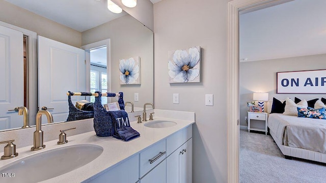 1021 Dillon Lake Dr, Knightdale, NC 27545 - ensuite bathroom featuring double vanity and baseboards