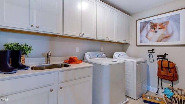 1021 Dillon Lake Dr, Knightdale, NC 27545 - laundry room featuring separate washer and dryer, cabinet space, and baseboards