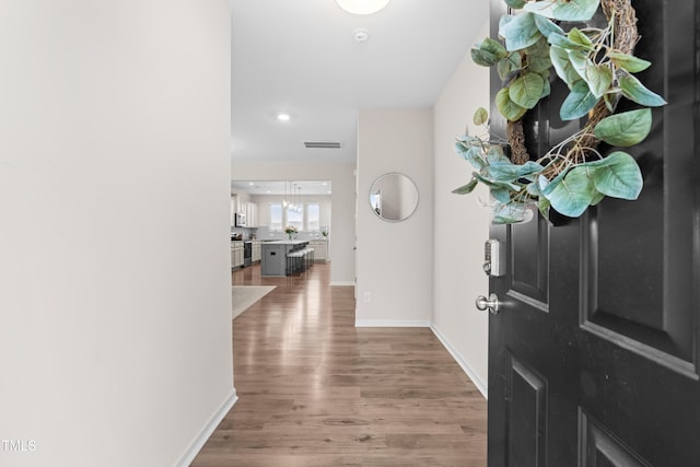 66 Arlie Ln, Lillington, NC 27546 - entrance foyer featuring wood finished floors and baseboards