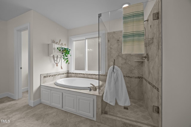 106 Fawley Ct, Cary, NC 27519 - full bath featuring a stall shower, a garden tub, baseboards, and tile patterned flooring
