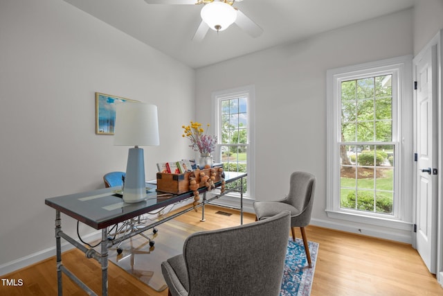 106 Fawley Ct, Cary, NC 27519 - home office featuring light wood-style flooring, baseboards, and ceiling fan
