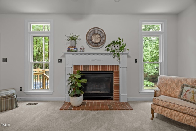 106 Fawley Ct, Cary, NC 27519 - living room with a brick fireplace, carpet, and baseboards