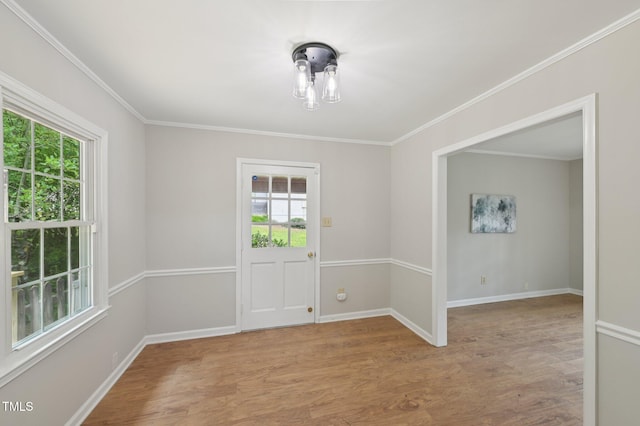 1308 Swallow Dr, Raleigh, NC 27606 - unfurnished room featuring wood finished floors, baseboards, and crown molding
