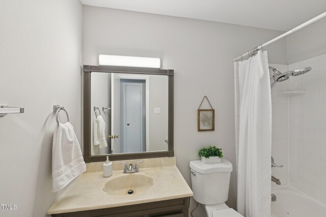 1308 Swallow Dr, Raleigh, NC 27606 - bathroom with vanity, shower / tub combo, and toilet