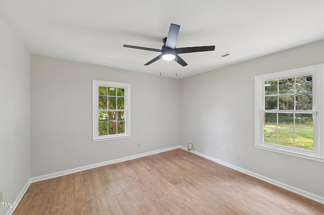 1308 Swallow Dr, Raleigh, NC 27606 - empty room featuring light wood finished floors, baseboards, and ceiling fan