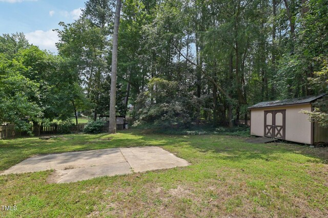 1308 Swallow Dr, Raleigh, NC 27606 - view of yard with a patio area