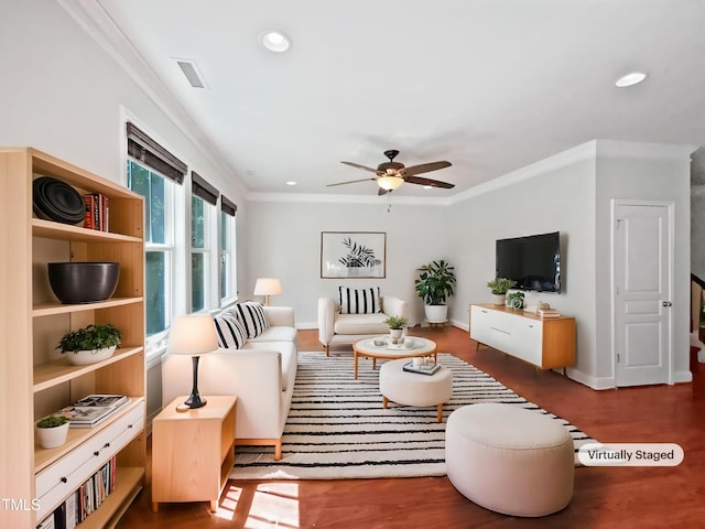 148 Daneborg Rd, Durham, NC 27703 - living area with ceiling fan, wood finished floors, ornamental molding, recessed lighting, and baseboards