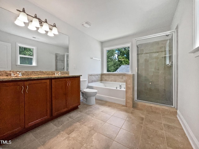 148 Daneborg Rd, Durham, NC 27703 - bathroom with a stall shower, a bath, double vanity, toilet, and baseboards