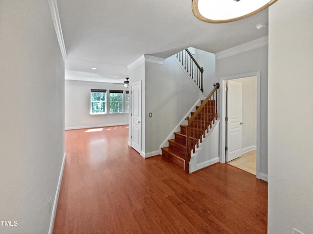148 Daneborg Rd, Durham, NC 27703 - foyer entrance with ornamental molding, wood finished floors, stairway, baseboards, and recessed lighting